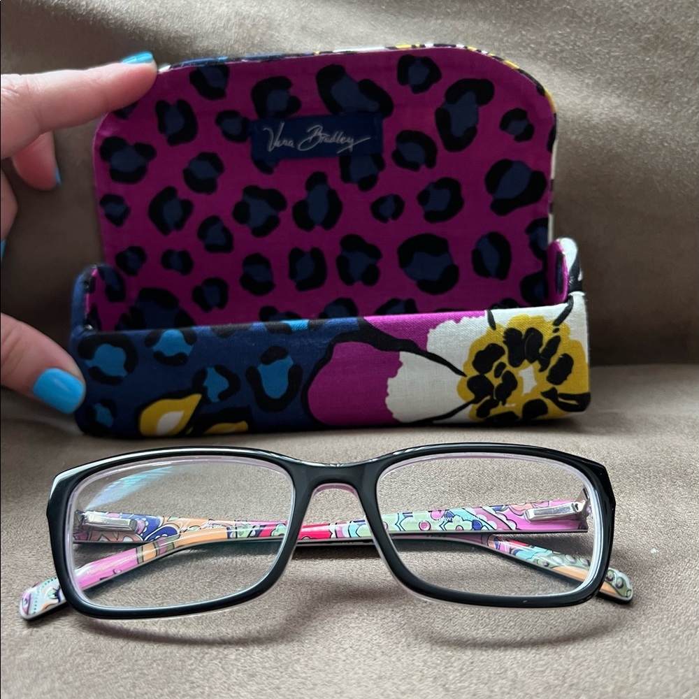 Vera Bradley, Marcella Pink Swirl (inside) and black outside. Rectangle shape.